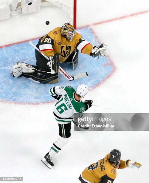 Joe Pavelski of the Dallas Stars tips a shot by John Klingberg past Robin Lehner of the Vegas Golden Knights for a second-period power-play goal...