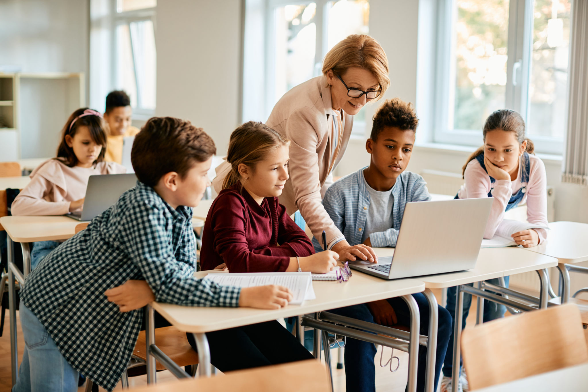 teacher guiding students
