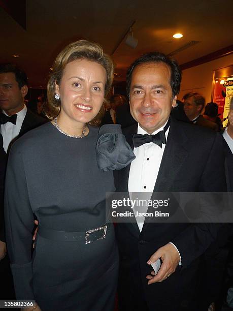 Jenny Paulson and John Paulson pose circa June 2009 in The Hamptons.