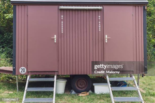 portable toilet waggon. catering service at a garden party, summer festival, or wedding. catering. - portable toilet - fotografias e filmes do acervo