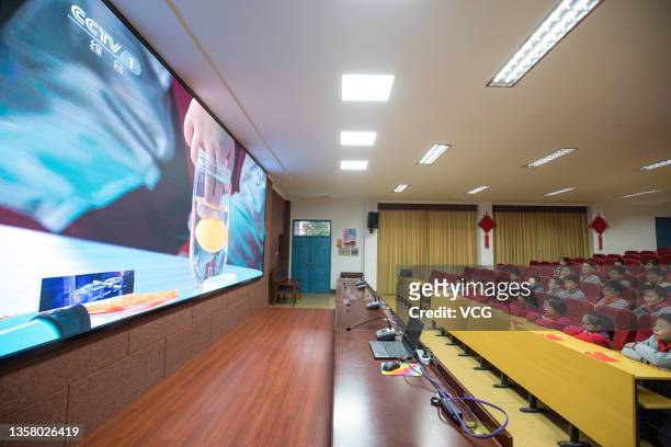 Students and teachers watch the first 'Tiangong Class', live lecture delivered by Chinese astronauts Zhai Zhigang, Wang Yaping and Ye Guangfu from...