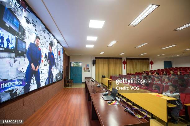 Students and teachers watch the first 'Tiangong Class', live lecture delivered by Chinese astronauts Zhai Zhigang, Wang Yaping and Ye Guangfu from...