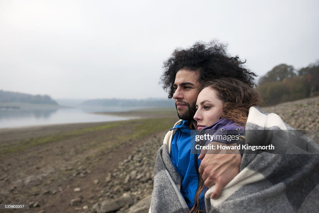 Romantic couple embacing at scenic location