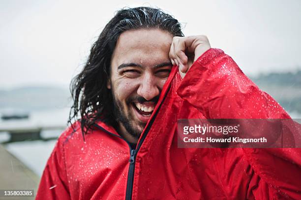 man laughing in the rain, portrait - weather man stock pictures, royalty-free photos & images