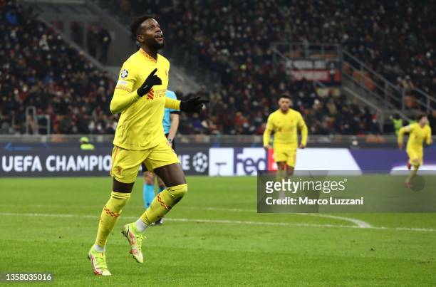Divock Origi of Liverpool celebrates after scoring their side's second goal during the UEFA Champions League group B match between AC Milan and...
