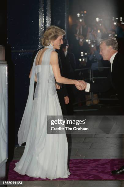 British Royal Diana, Princess of Wales , wearing a chiffon Catherine Walker evening gown, attends a Royal Gala Performance of 'Miss Saigon', held at...