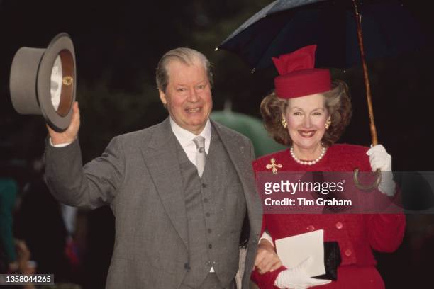 British nobleman John Spencer, 8th Earl Spencer and his wife, British socialite Raine Spencer, Countess Spencer , attends the wedding of his son,...