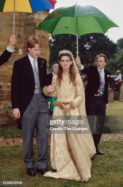 British peer and journalist Charles Spencer, 9th Earl Spencer and his bride, British fashion model Victoria Lockwood, wearing a wedding dress...