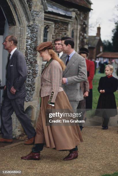 British Royals Prince Philip, Duke of Edinburgh , Sarah, Duchess of York, wearing a tweed jacket with a black collar, a long brown skirt, and a...