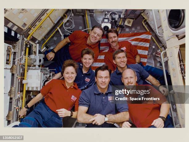 Inflight crew portrait pose in the Spacelab module during Space Shuttle Columbia mission STS-73, 20th October to 5th November 1995. STS-73 is the...