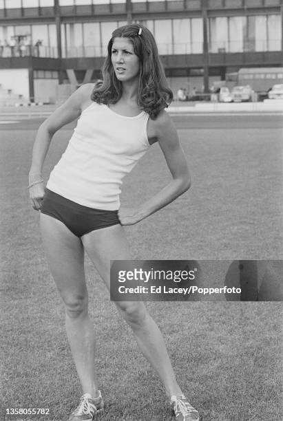 Canadian athlete Debbie Van Kiekebelt takes part in a warm up session on the training track in the Olympic village prior to competing for the Canada...