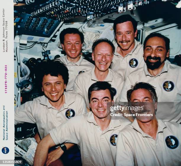 Inflight crew portrait on the flight deck of the Space Shuttle Columbia during mission STS-75, 22nd February to 9th March 1996. The primary objective...