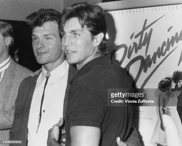 American actor, singer and dancer Patrick Swayze and American actor Eric Roberts attend the New York premiere of 'Dirty Dancing', held at the Gemini...
