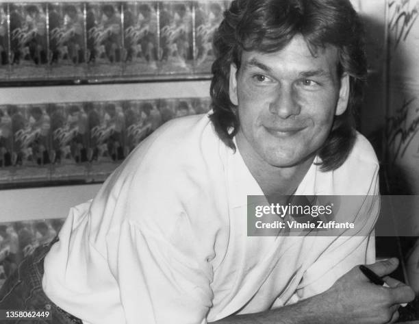 American actor, singer and dancer Patrick Swayze attends an in-store promotional event where he signed copies of the soundtrack to 'Dirty Dancing',...