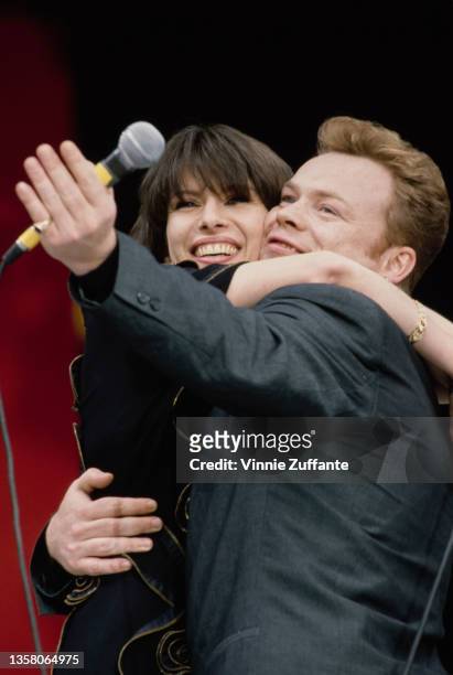 American singer-songwriter and musician Chrissie Hynde and British singer and songwriter Ali Campbell perform at the Nelson Mandela 70th birthday...