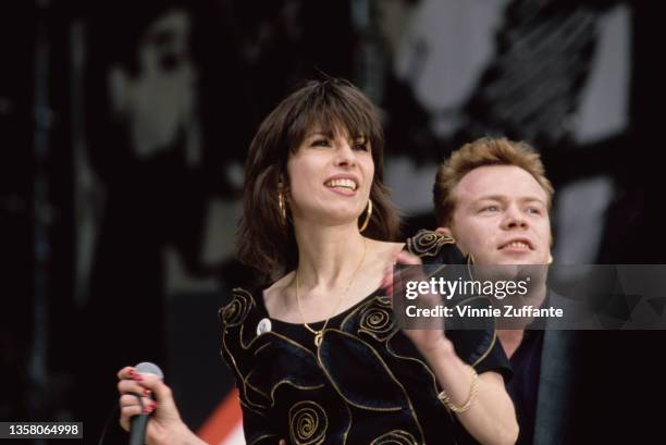 American singer-songwriter and musician Chrissie Hynde and British singer and songwriter Ali Campbell perform at the Nelson Mandela 70th birthday...