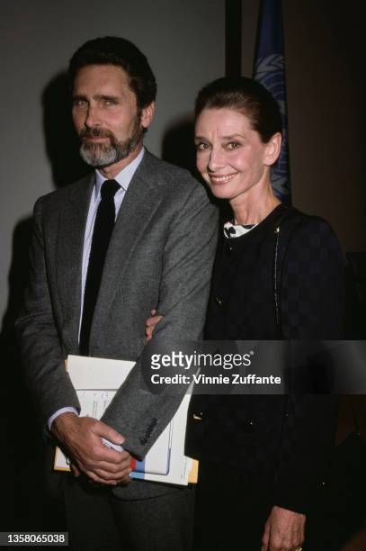 Dutch television actor Robert Wolders and British actress Audrey Hepburn , the newly-appointed UNICEF Special Ambassador, attends a UNICEF press...