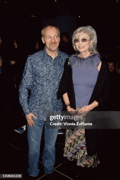 British singer, songwriter and guitarist Peter Frampton and American singer, songwriter, and guitarist Emmylou Harris attend the 2001 Orville H...