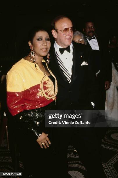 American singer, songwriter and pianist Aretha Franklin and American music industry executive Clive Davis attend the party for the Night Of 100 Stars...