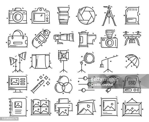 photography related objects and elements. hand drawn vector doodle illustration collection. hand drawn icons set. - reflector stock illustrations