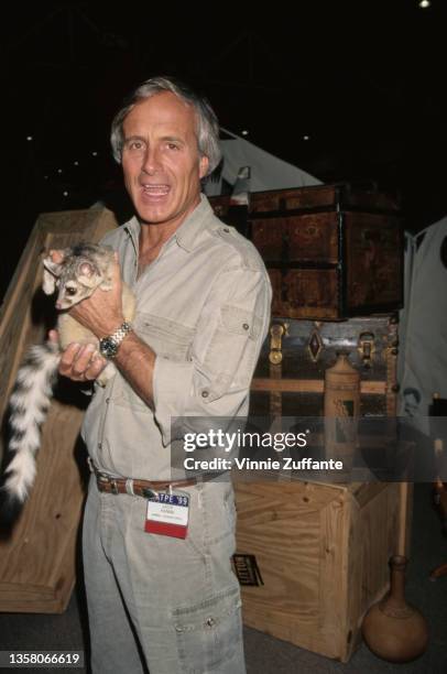American zookeeper Jack Hanna holding a lemur attends the 36th Annual National Association of Television Program Executives Convention and...