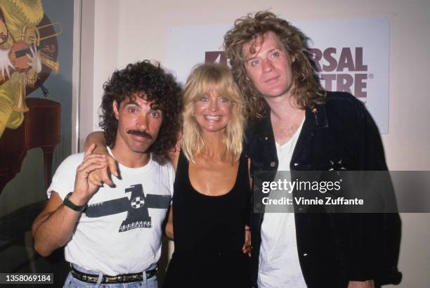 American singer, songwriter and guitarist John Oates, American actress Goldie Hawn, and American singer, guitarist and keyboard player Daryl Hall...