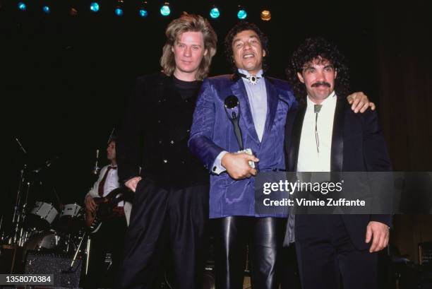 American singer, guitarist and keyboard player Daryl Hall, American singer and songwriter Smokey Robinson, and American singer, songwriter and...
