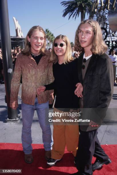 American power pop band Hanson attends the 1998 MTV Video Music Awards, held at Universal Studios in Los Angeles, California, 10th September 1998.