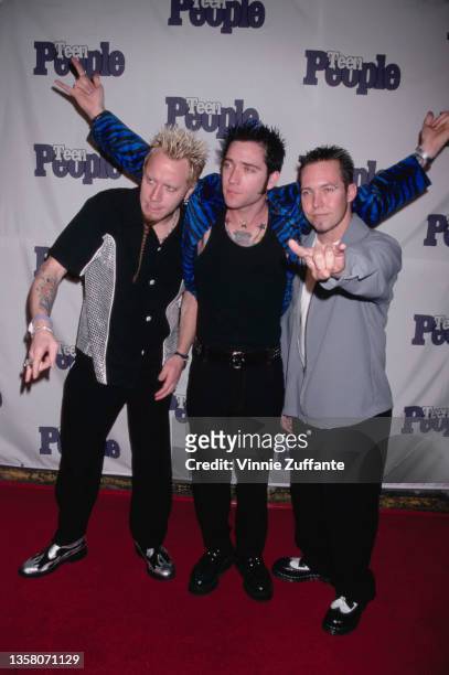 American pop punk band Lit (American singer and musician A Jay Popoff, American guitarist Jeremy Popoff, and American drummer Allen Shellenberger...