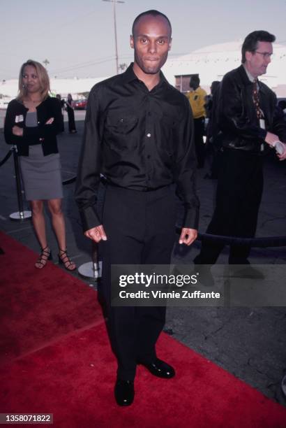 American singer-songwriter Kenny Lattimore attends the 1999 Soul Train Music Awards, held at the Shrine Auditorium in Los Angeles, California, 26th...