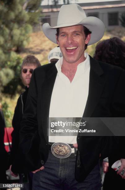 American singer-songwriter and musician Chris LeDoux attends the 29th Annual Academy of Country Music Awards, held at the Universal Amphitheatre in...