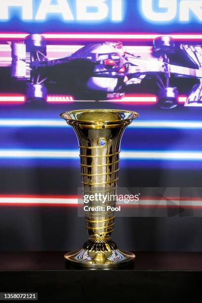 The FIA Formula One World Drivers Championship Trophy is pictured in the Drivers Press Conference during previews ahead of the F1 Grand Prix of Abu...