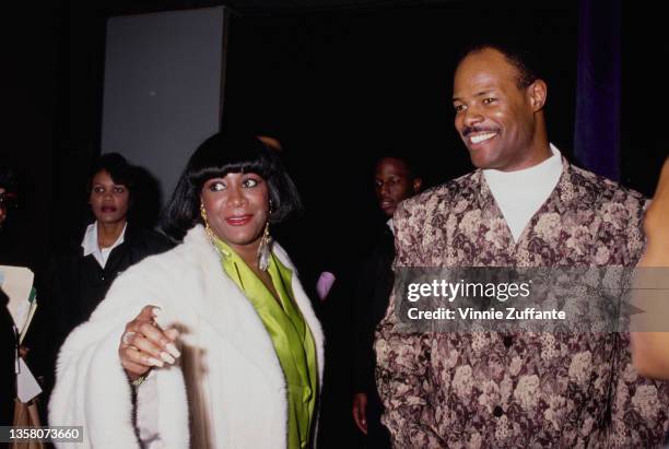American singer and actress Patti LaBelle and American actor and comedian Keenen Ivory Wayans attend the 1991 Soul Train Music Awards, held at the...