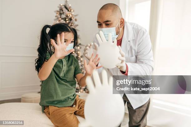 happy child after vaccination - kids hospital christmas stock pictures, royalty-free photos & images