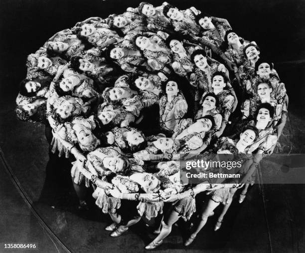 Famous precision dancers, the Rockettes, pose at Radio City Music Hall, 18th May 1943.