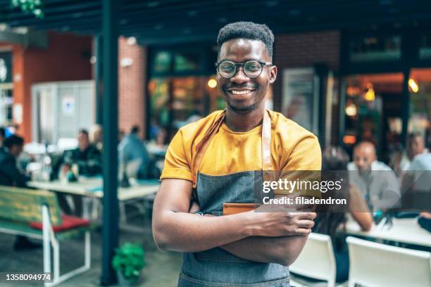 cheerful barista - franchise stock pictures, royalty-free photos & images