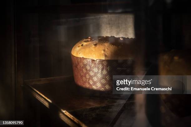 General picture shows the dough baking inside an oven during the preparation of Panettone at Panificio Davide Longoni workshop on December 09, 2021...