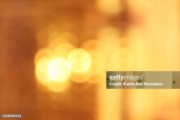 golden dreams of dawn. abstract - gold bokeh stock pictures, royalty-free photos & images