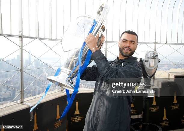 Soccer legend Ashley Cole visits the Empire State Building with the Champions League Trophy at The Empire State Building on December 09, 2021 in New...