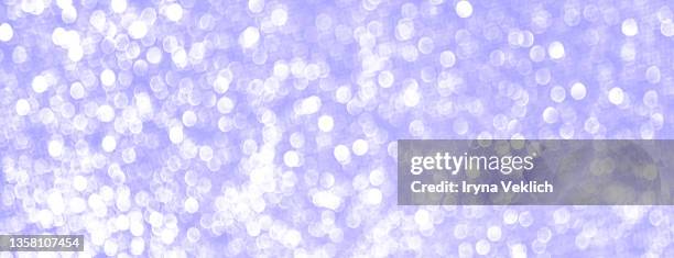 xmas present, gift, congratulation, beauty product shiny glittering background  in trendy color of the year 2022 very peri  purple violet  color.  glitter winter holidays and black friday trendy concept. - スパンコール ストックフォトと画像