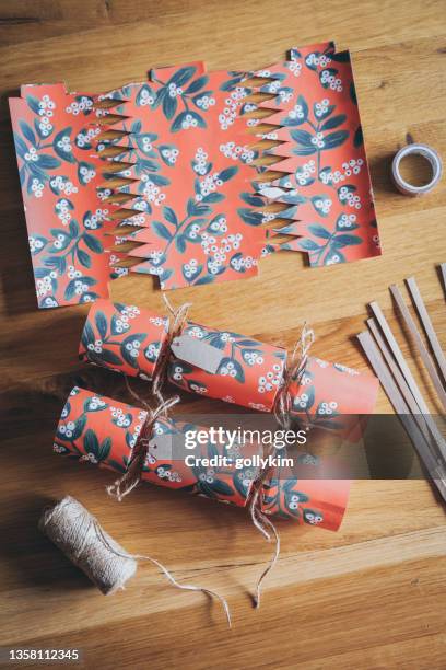 homemade christmas crackers - christmas crackers stock pictures, royalty-free photos & images