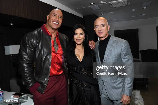 Dwayne Johnson, Lauren Sanchez, and Jeff Bezos attend the 2021 People's Choice Awards at Barker Hangar on December 07, 2021 in Santa Monica,...