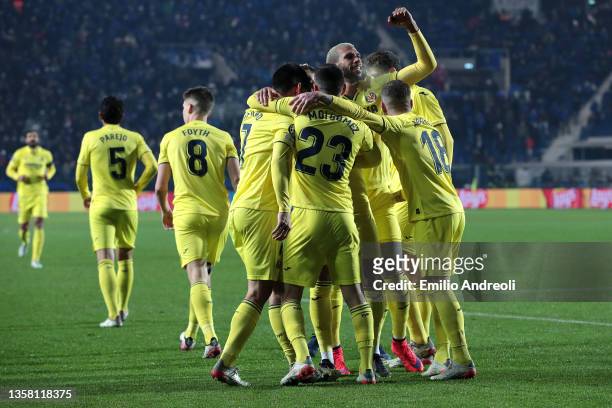 Arnaut Danjuma celebrates with teammates Gerard Moreno, Moi Gomez and Alberto Moreno of Villarreal CF after scoring their team's third goal during...