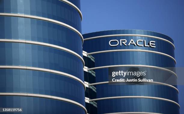 The Oracle logo is displayed on the exterior of Oracle's former headquarters on December 09, 2021 in Redwood Shores, California. Oracle will report...