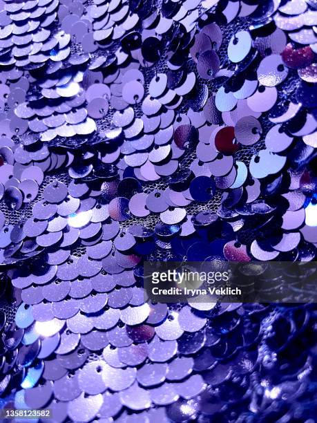xmas present, gift, congratulation, beauty product shiny glittering background  in trendy color of the year 2022 very peri  purple violet  color.  glitter winter holidays and black friday trendy concept. - lentejuelas fotografías e imágenes de stock
