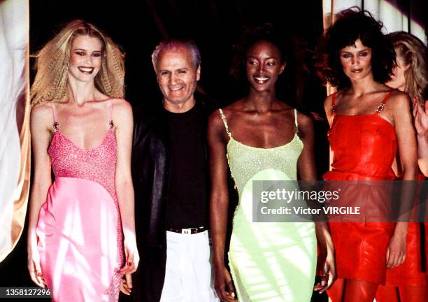 Claudia Schiffer, fashion designer Gianni Versace, Naomi Campbell and Helena Christensen walk the runway during the Versace ready to Wear Fall/Winter...