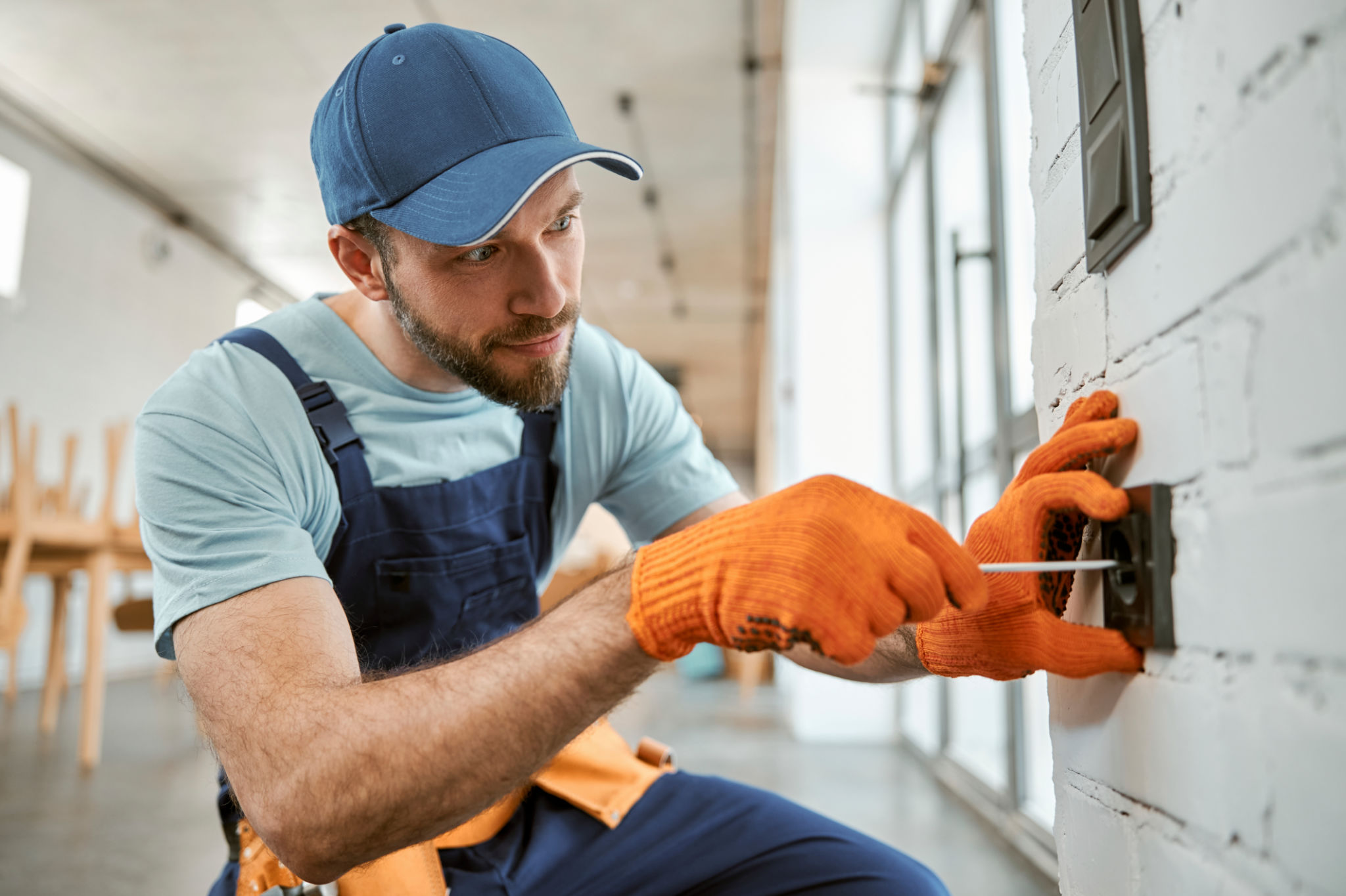 man using screwdriver