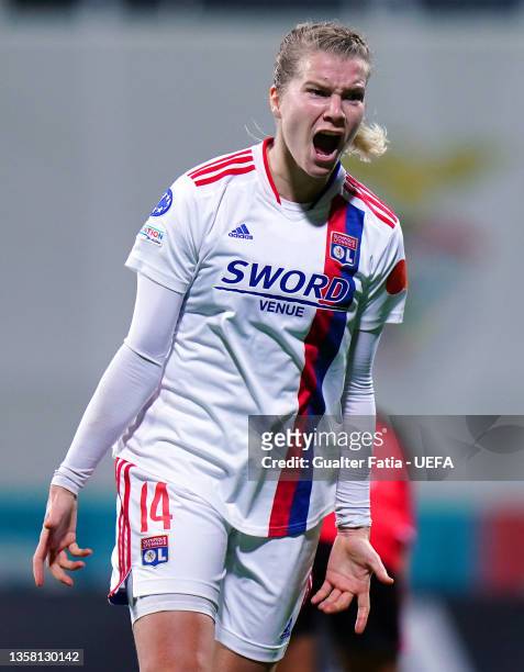 Ada Hegerberg of Olympique Lyon celebrates after scoring their side's fourth goal during the UEFA Women's Champions League group D match between SL...