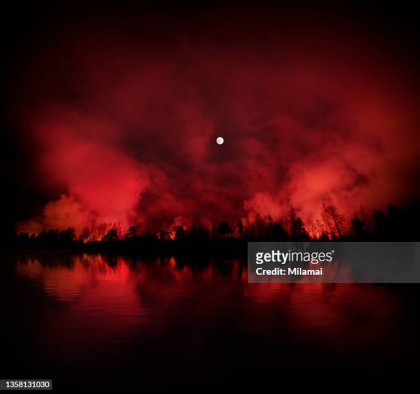 mysterious red smoke, clouds and moon at night. dark gothic mood. - spooky smoke stock pictures, royalty-free photos & images