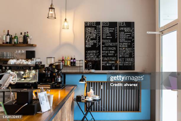 interior of a small local coffee shop - cafe menu retro stock pictures, royalty-free photos & images